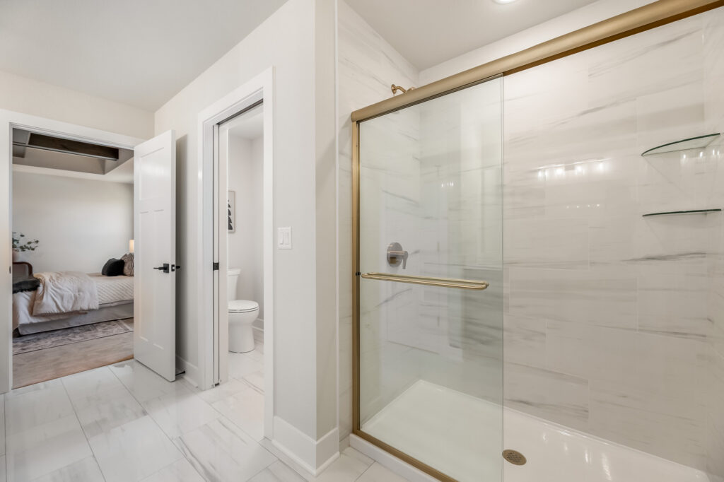 The Julia Master Bathroom by Stepping Stone Homes WI