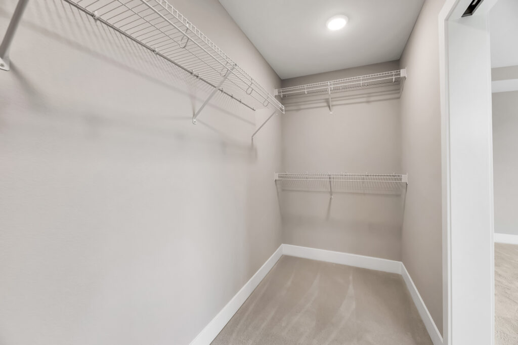The Jude Two-Story Home Plan Master Suite Walk-In Closet