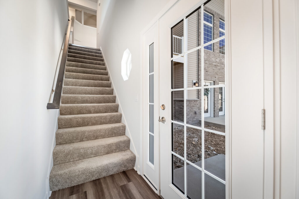 Edgewood Meadows Upper Condo Entry Door by Stepping Stone Homes