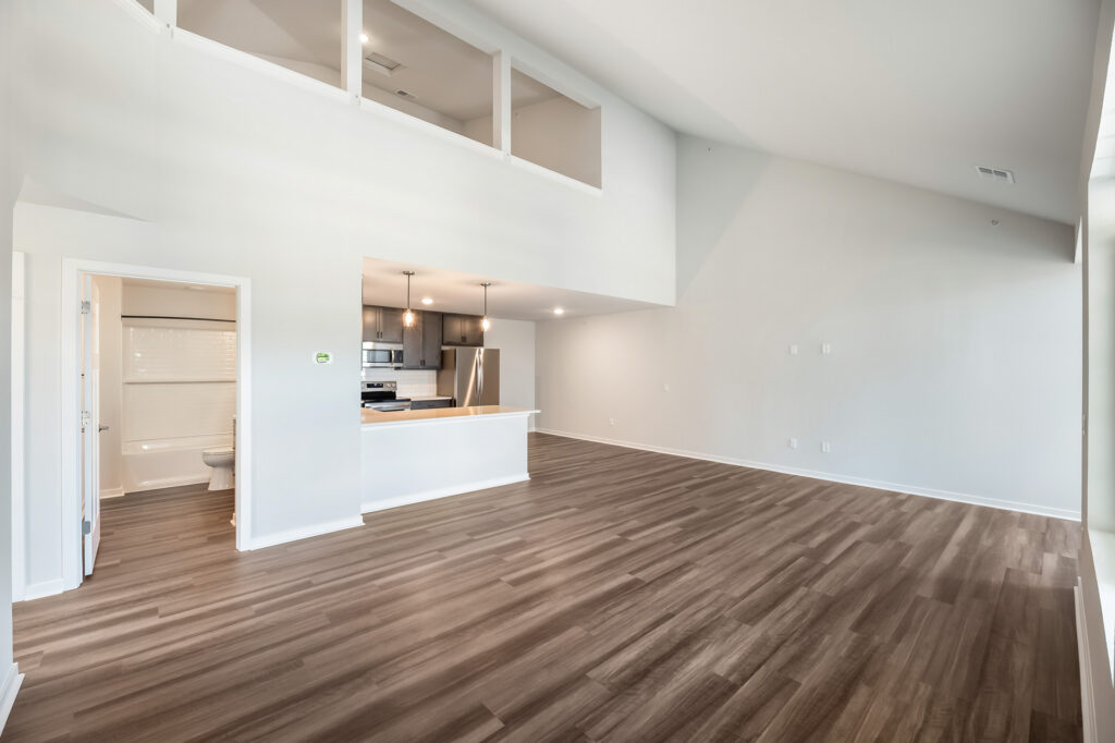 Edgewood Meadows Upper Condo Great Room by Stepping Stone Homes
