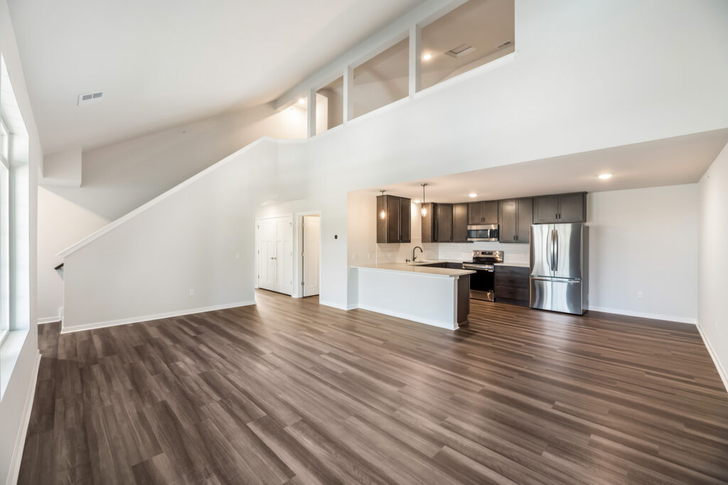Edgewood Meadows Upper Condo Great Room by Stepping Stone Homes