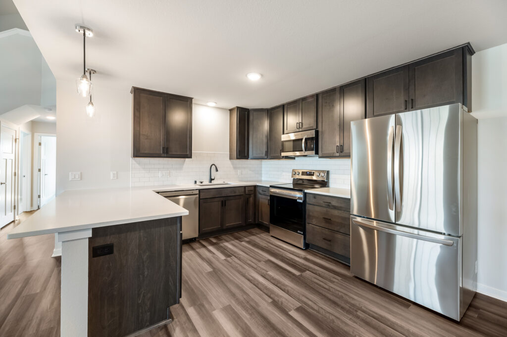 Edgewood Meadows Upper Condo Kitchen by Stepping Stone Homes