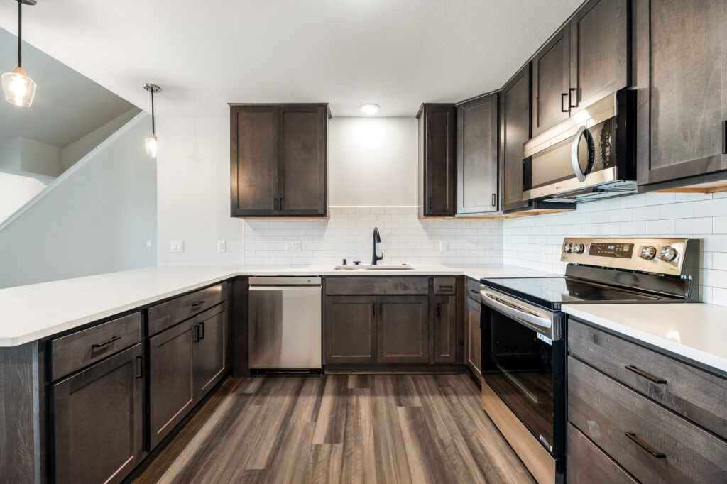 Edgewood Meadows Upper Condo Kitchen by Stepping Stone Homes