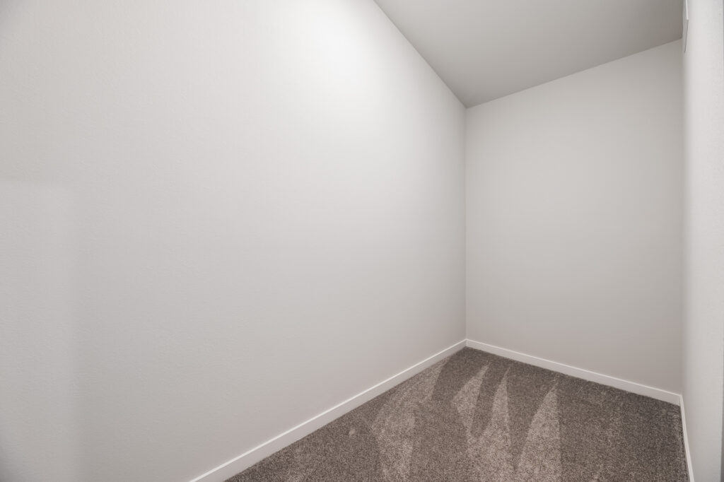 Edgewood Meadows Upper Condo Mezzanine Closet by Stepping Stone Homes