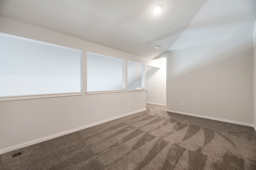 Edgewood Meadows Upper Condo Mezzanine by Stepping Stone Homes