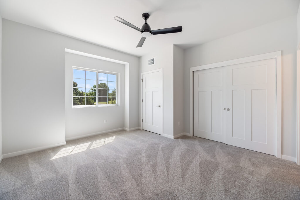 Edgewood Meadows Upper Condo Master Bedroom by Stepping Stone Homes