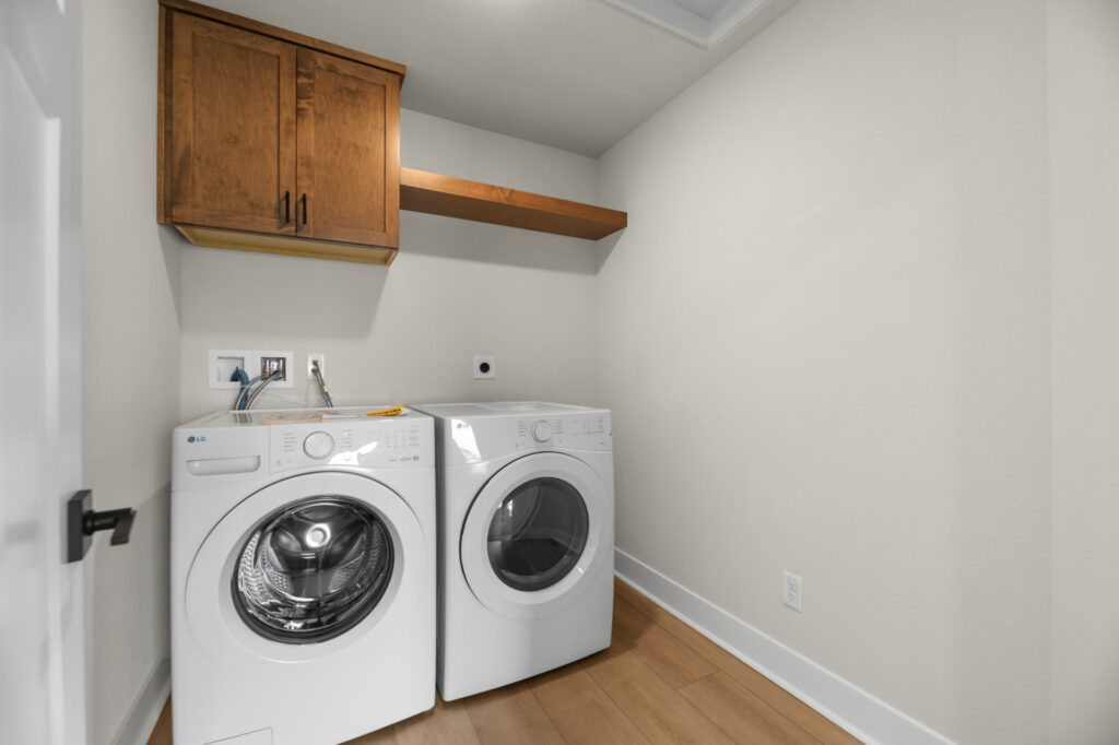 The Prescott Laundry Room by Stepping Stone Homes WI