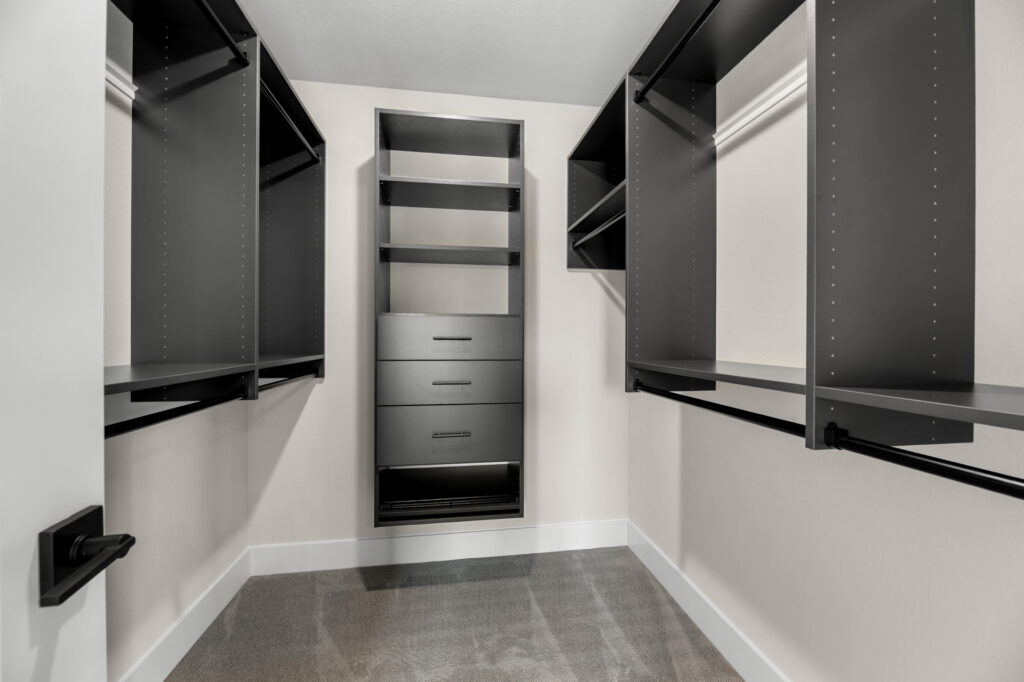 The Prescott Master Closet by Stepping Stone Homes WI