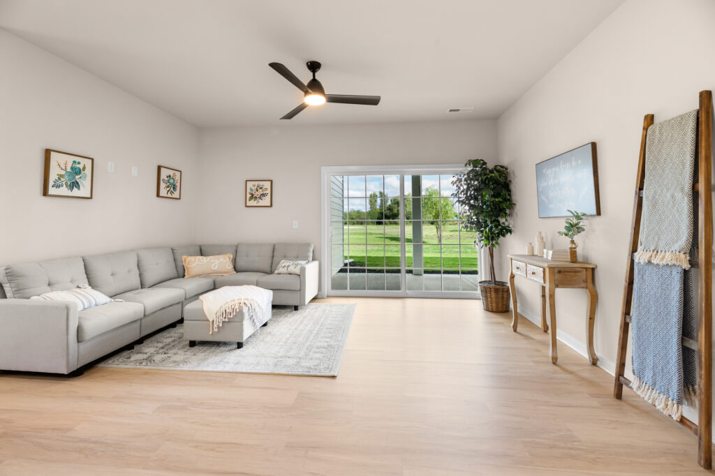 Quiet Meadows Great Room by Stepping Stone Homes WI