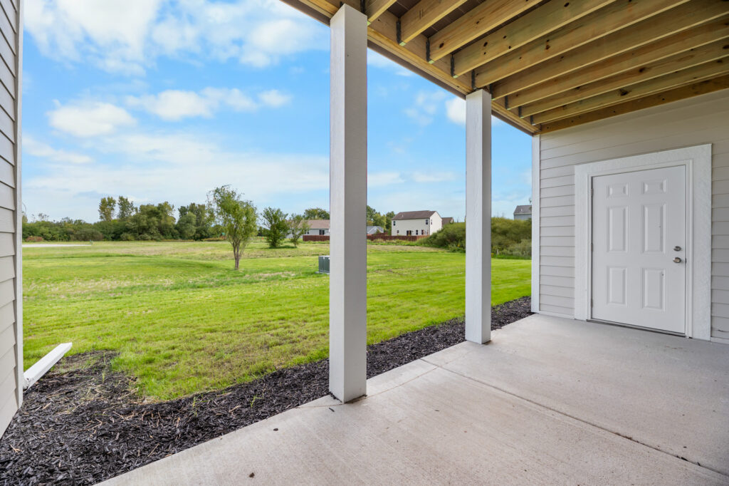 Quiet Meadows Patio by Stepping Stone Homes WI
