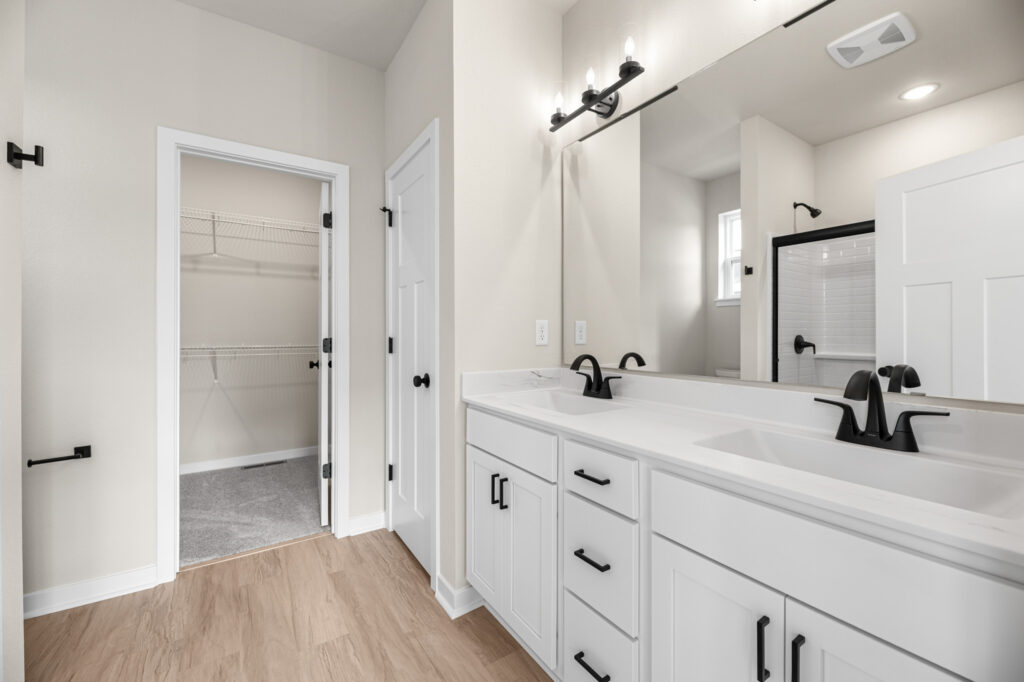 The Rosebud Master Bathroom by Stepping Stone Homes WI