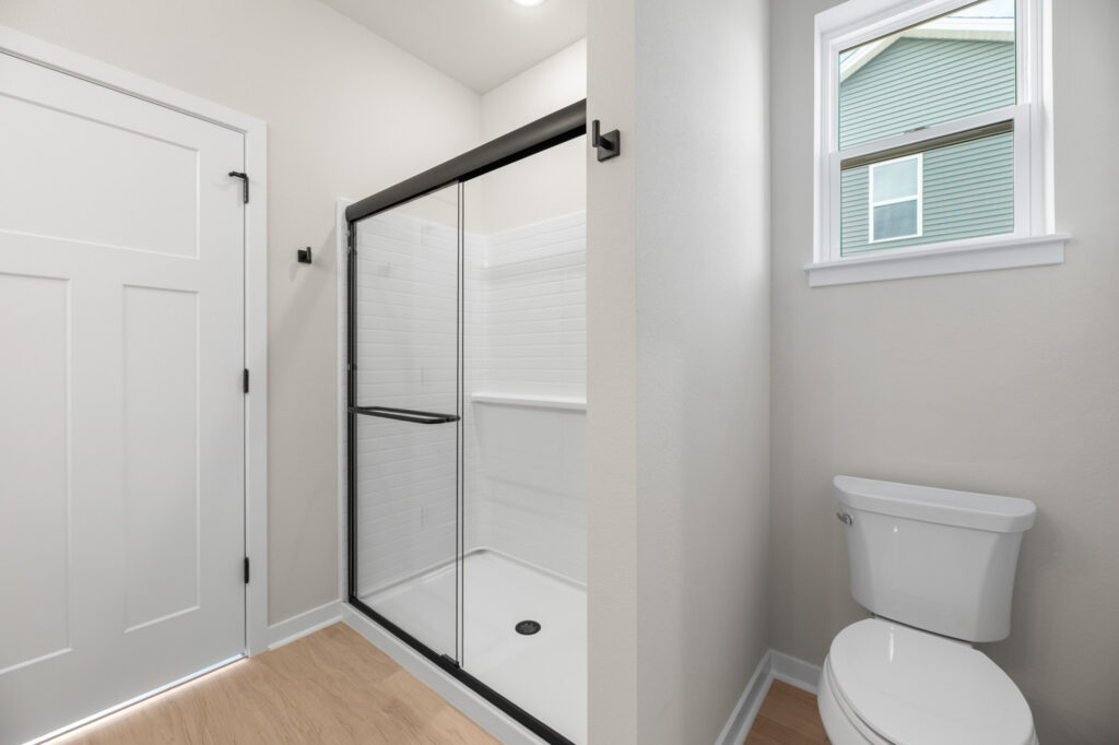 The Rosebud Master Bathroom by Stepping Stone Homes WI