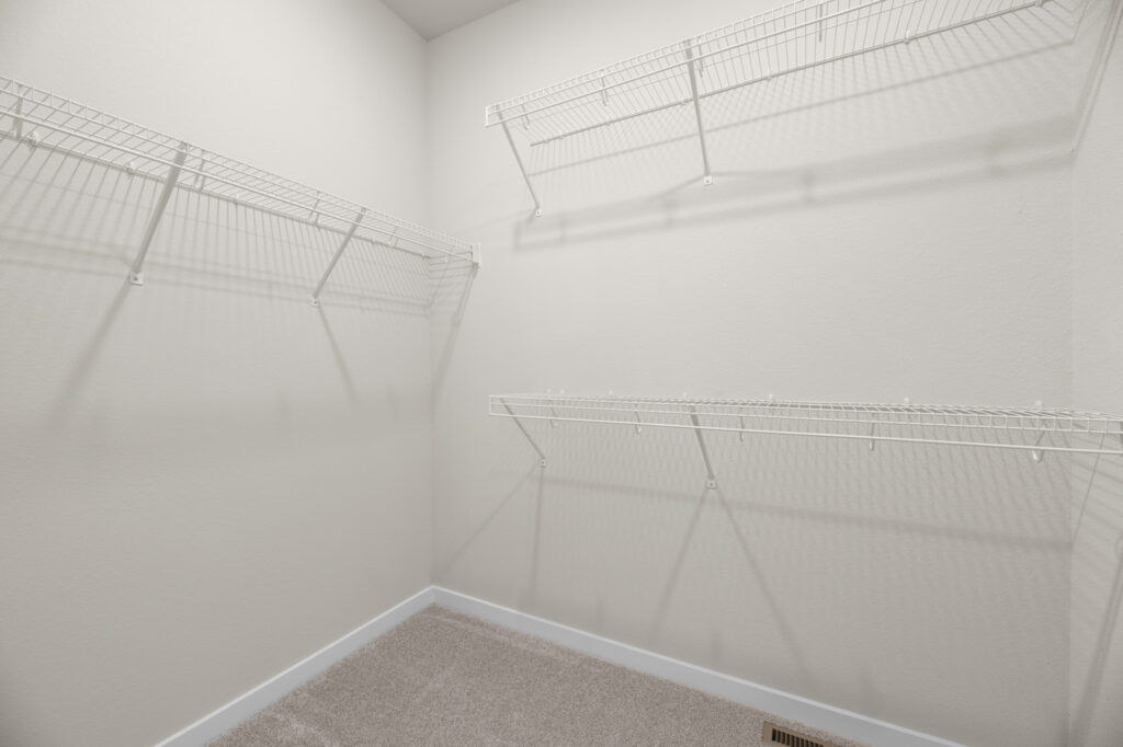 The Rosebud Master Closet by Stepping Stone Homes WI