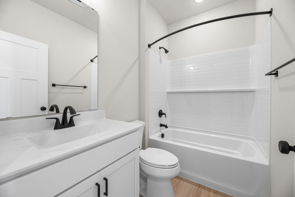 The Rosebud Bathroom by Stepping Stone Homes WI