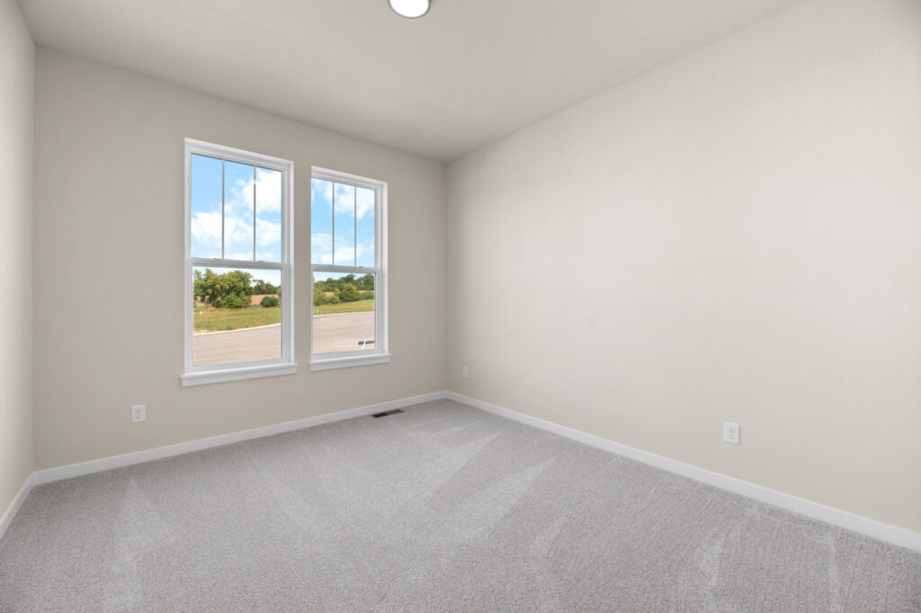 The Rosebud Bedroom by Stepping Stone Homes WI