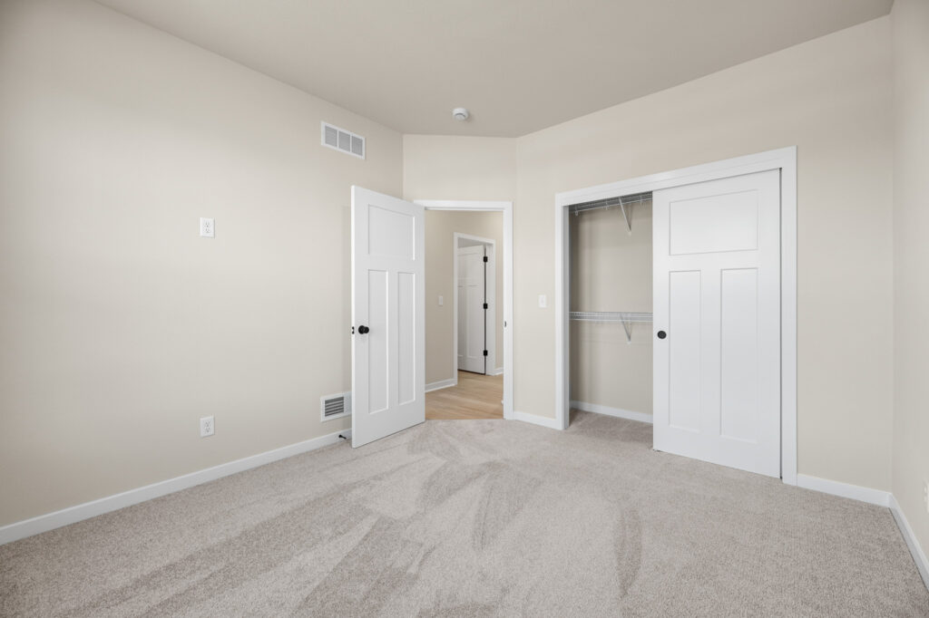The Rosebud Bedroom by Stepping Stone Homes WI